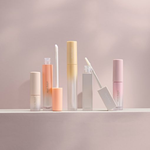 minimalist stock packaging for lip gloss, liquid lipstick and concealer. Make-up, cosmetics and beauty products. Manufactured by HCP Packaging.