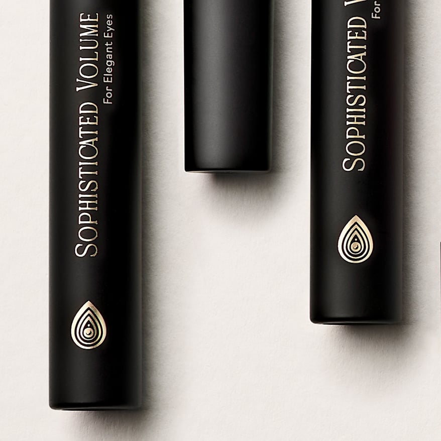 Close-up of hot foil stamping detail on mascara packaging, showcasing premium metallic branding and precise decorative finishing.